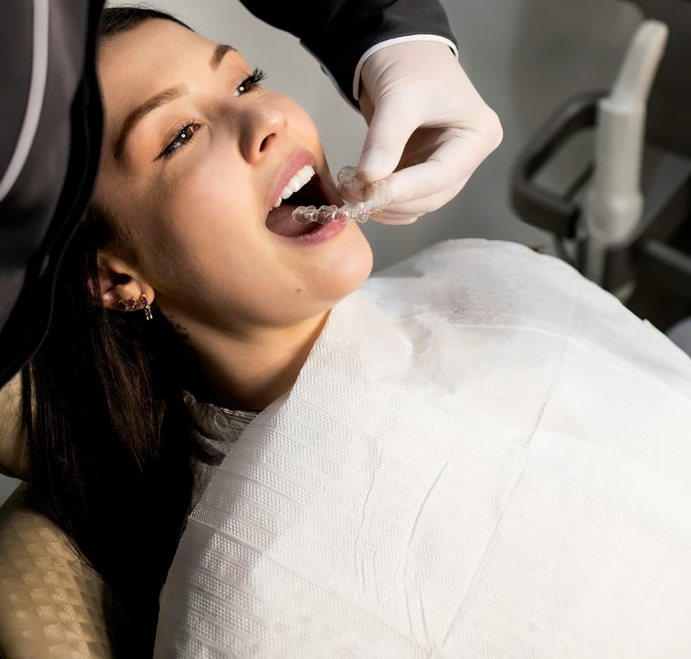 Smiling patient receiving dental checkup at Cleveland dental clinic