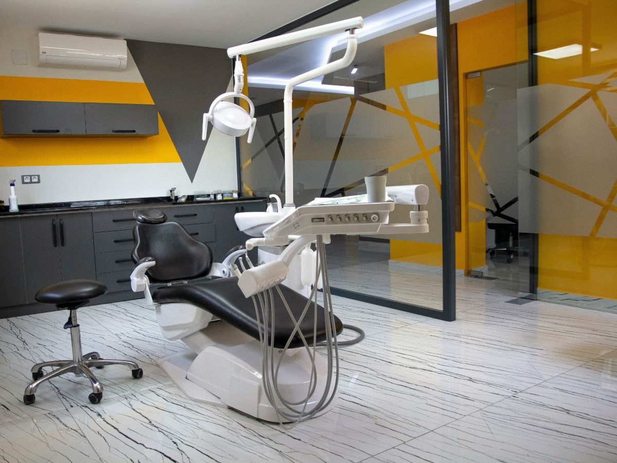 A dentist performing a routine dental check-up